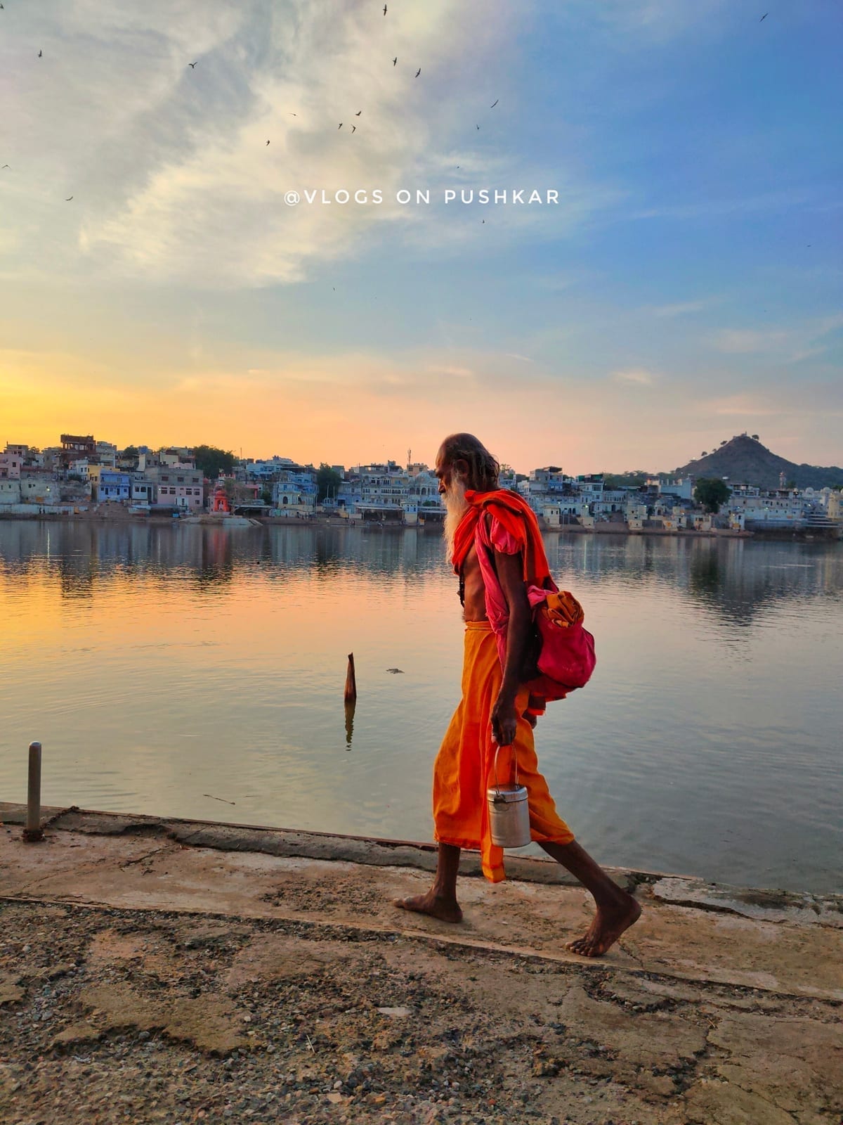 Devotees performing puja rituals at Pushkar Lake ghats